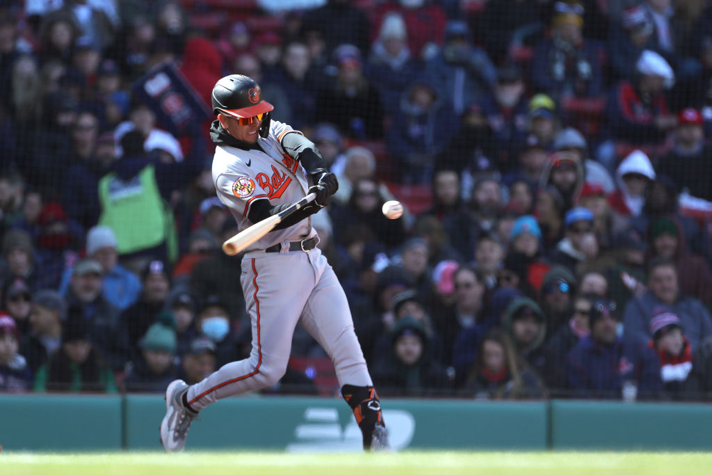 Ramon Urias of the Baltimore Orioles triples against the Houston