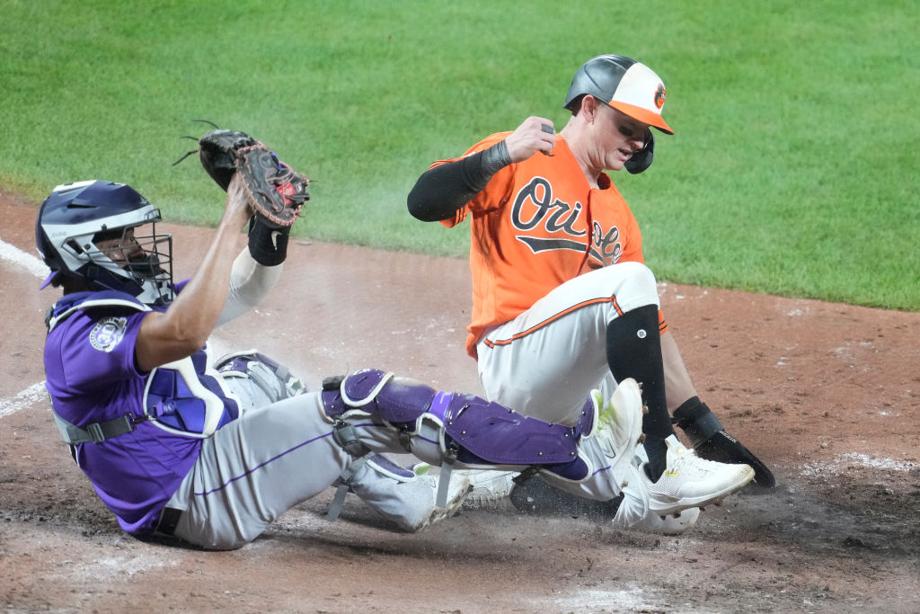 Rockies win with two runs in 10th inning; saved by replay