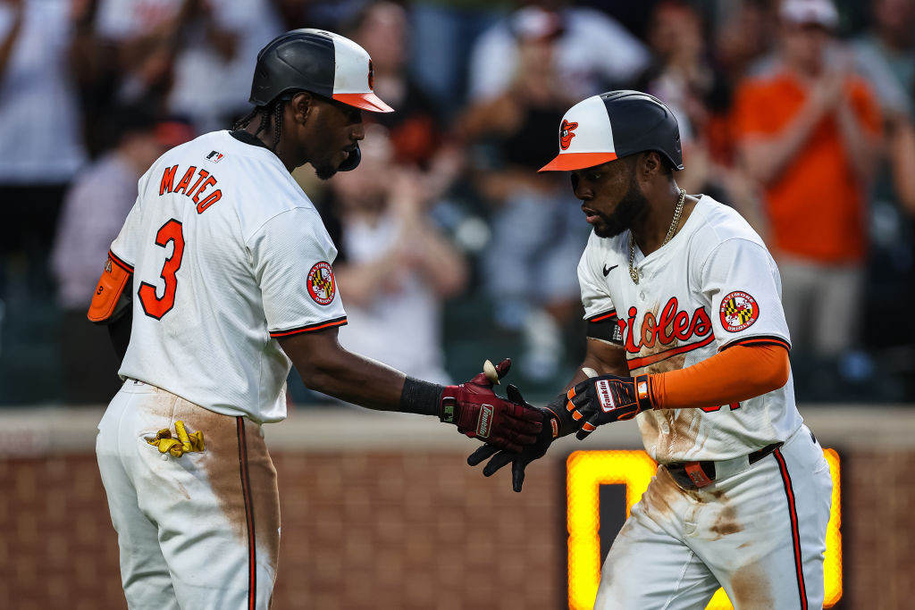 Jorge Mateo and Cedric Mullins celebrate home run