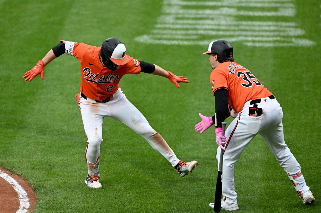 Gunnar Henderson and Adley Rutschman celebrate