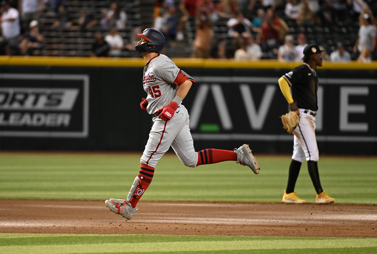 Marte delivers clutch hit as the Reds rally in 9th to beat the