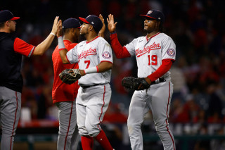 Josh Bell Maikel Franco fives line gray