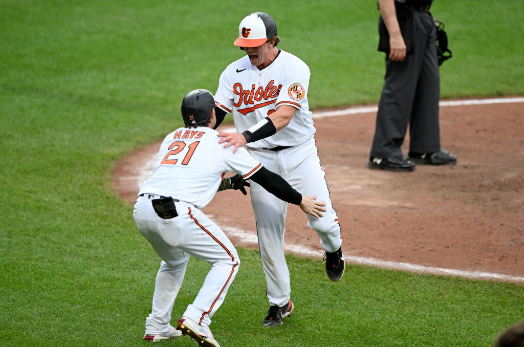 Trey Mancini returns from cancer, singles in first game for Orioles -  Sports Illustrated