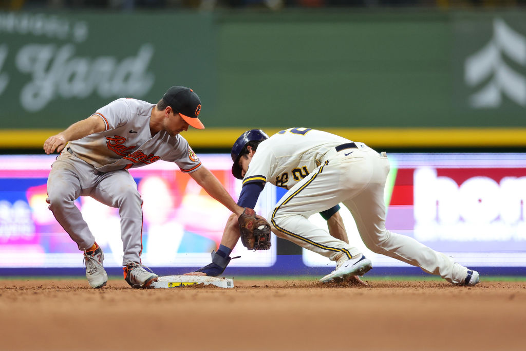 Tag at home plate caps Brewers' 4-3 victory over Pirates